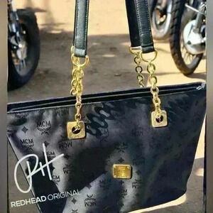 MCM Auth.LG Tote Shoulder Bag Logo canvas w/black leather details. Gold hardware